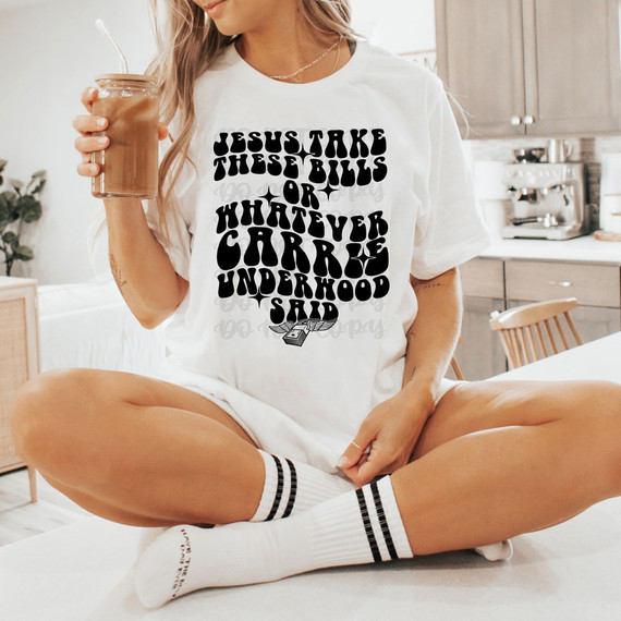 Jesus Take These Bills DTF Heat Transfer, product image of a white T-shirt with black text design.