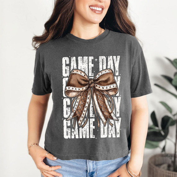 Game Day Stacked Bow DTF Heat Transfer, a decorative iron-on design featuring a large, detailed brown bow with printed accents, perfect for customizing apparel for game day celebrations.