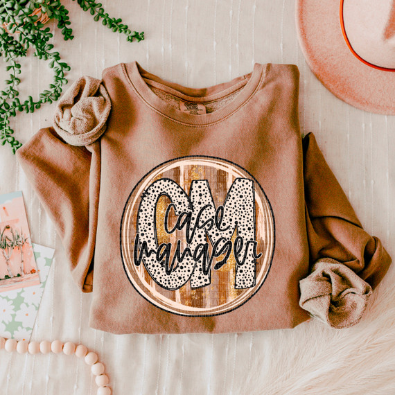 Case Manager Fall Brushstrokes DTF Heat Transfer, orange sweatshirt with a circular design featuring the words 'Oklahoma' in a dotted pattern and 'Calm' handwritten style.