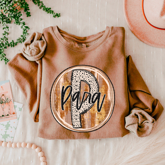 Para Fall Brushstrokes DTF Heat Transfer, custom graphic heat transfer on folded pink sweatshirt with autumn-themed background.