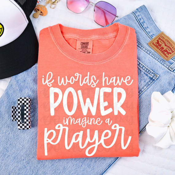 If Words Have Power Imagine A Prayer WHITE DTF Heat Transfer, a white heat transfer design on a coral-colored T-shirt.