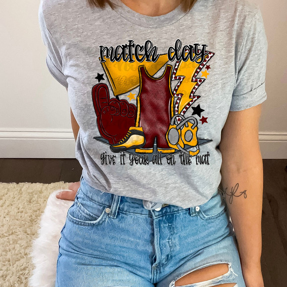 Match Day Give It Your All On The Mat Maroon/Gold DTF Heat Transfer, colorful graphic T-shirt design featuring sports equipment and motivational text.