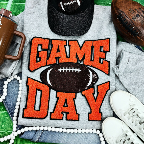 Orange Chenille Game Day with Sequin Football Patch, close-up of a football-themed sweatshirt featuring sporty letters and a football design.