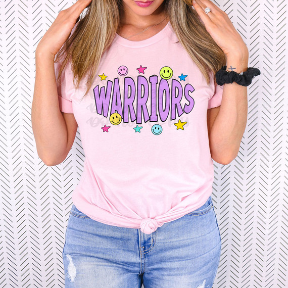 Warriors Happy Face DTF Heat Transfer, colorful cheerful smiley face design with stars and text on a pink t-shirt worn by a woman.