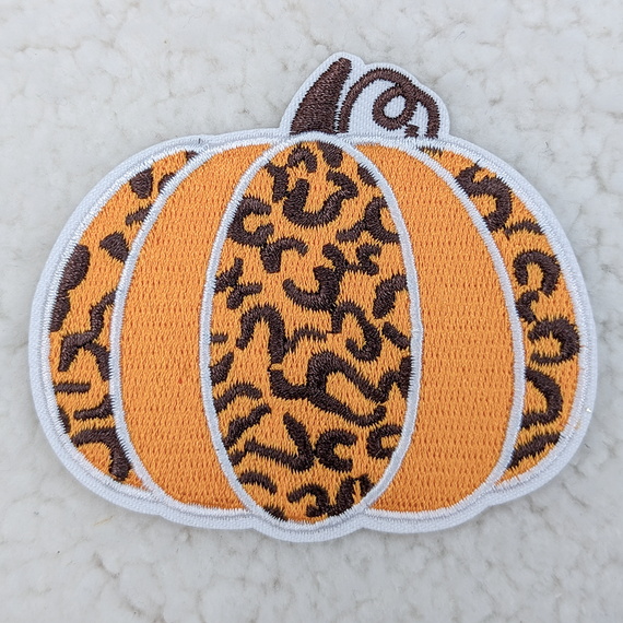 Leopard Pumpkin Embroidered HAT/POCKET Patch, Halloween-themed pumpkin embroidered patch with leopard print design in orange, black, and white colors.