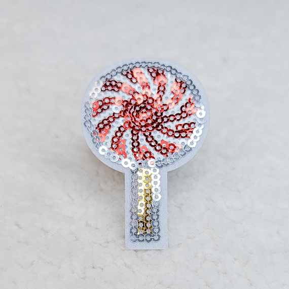 Peppermint Lollypop Sequin Hat/Pocket Patch, decorative sequin patch shaped like a peppermint lollypop with red and silver sequins on a white background.