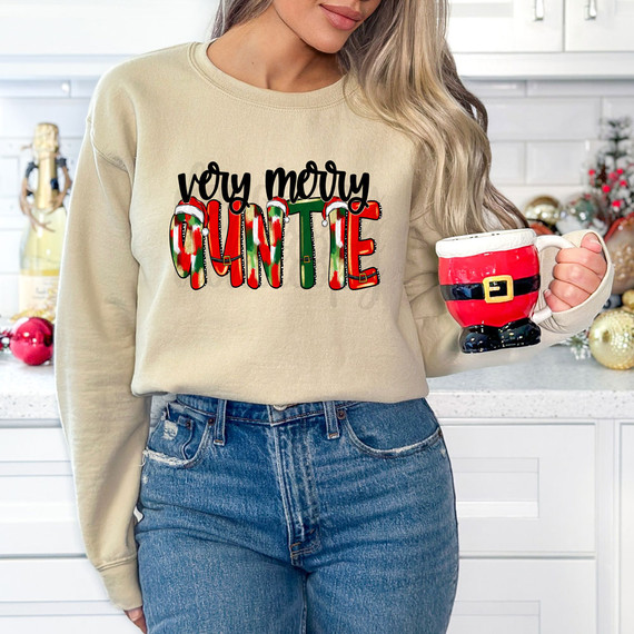Very Merry Auntie DTF Heat Transfer, Christmas themed sweatshirt with colorful holiday design and text.