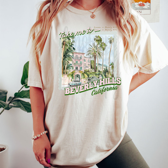 Take Me To Beverly Hills California DTF Heat Transfer, colorful t-shirt design featuring an illustration of Beverly Hills with palm trees and a pink building scene.