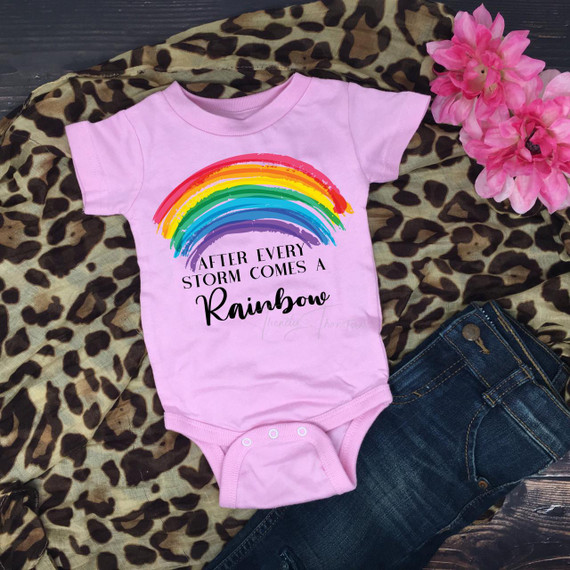 Rainbow Baby INFANT FINAL STOCK Screen Print Transfer, pink baby onesie with rainbow graphic and the quote 'After every storm comes a rainbow' printed on it.