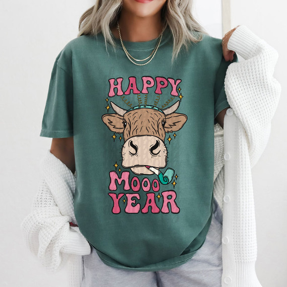 Happy Mooo Year DTF Heat Transfer, humorous cow illustration with the words 'Happy Mooo Year' on a teal T-shirt.