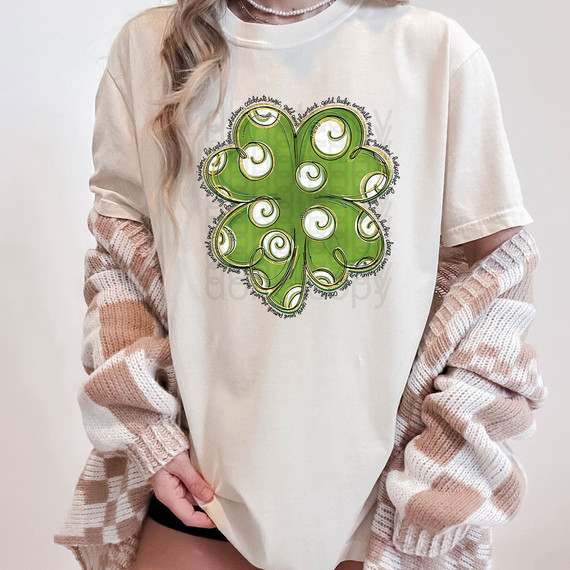Hand Drawn Shamrock DTF Heat Transfer, a green shamrock with swirl patterns and decorative text.