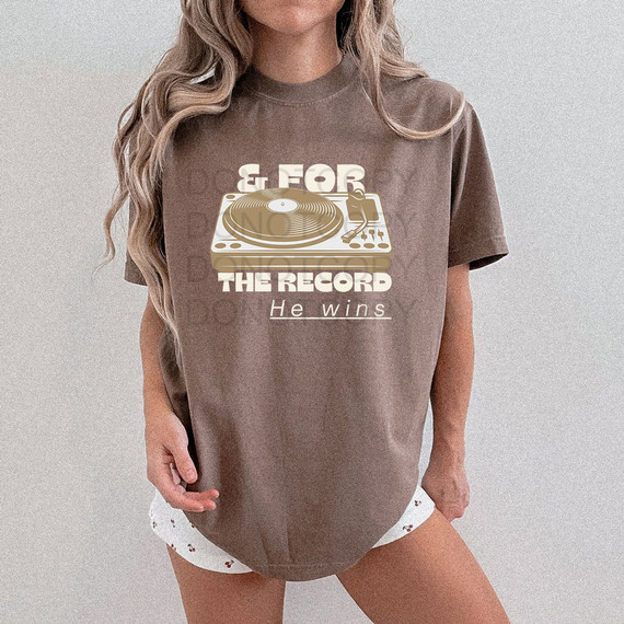 For The Record He Wins DTF Heat Transfer, a graphic of a turntable on a brown T-shirt.