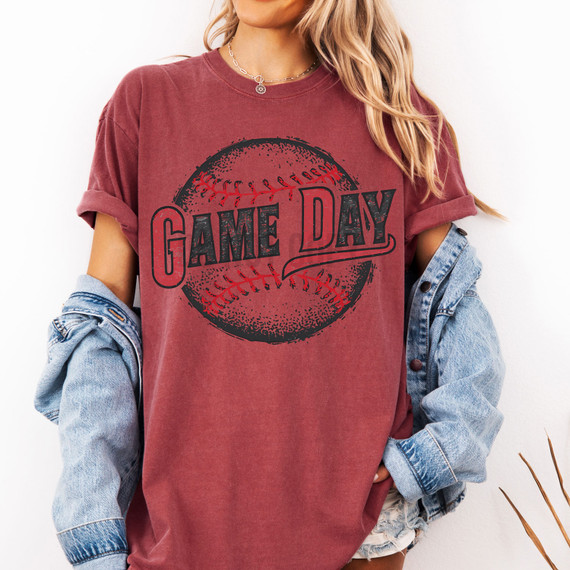 Distressed Game Day DTF Heat Transfer, worn on a red t-shirt with a baseball graphic and the words 'Game Day' in black and red lettering.