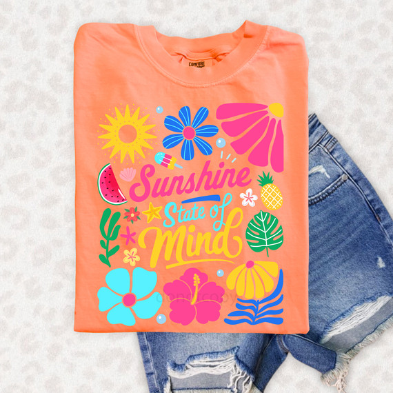Sunshine State Of Mind DTF Heat Transfer, colorful floral and sun graphic design on peach-colored t-shirt.
