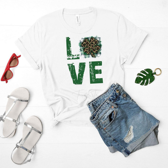 Love Clover St. Patrick's Day Sublimation Transfer, T-shirt with a leopard print shamrock and the word LOVE written in green distressed font.