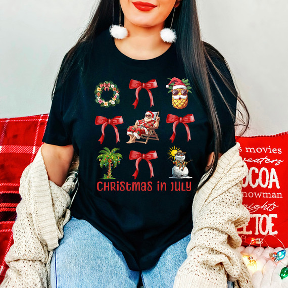 Tropical Christmas In July DTF Heat Transfer, a woman wearing a holiday-themed T-shirt with Christmas symbols and phrases for summer festive celebration.