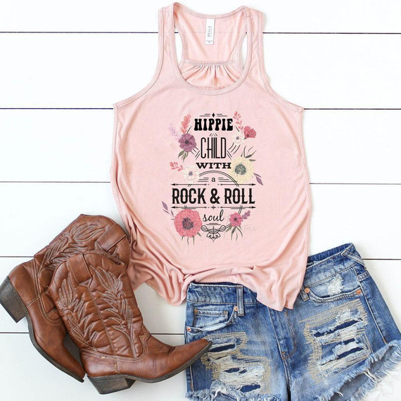 Hippie Child With a Rock and Roll Soul FINAL STOCK Screen Print Heat Transfer T-shirt, pink tank top with floral and musical design, paired with distressed denim shorts and brown cowboy boots.