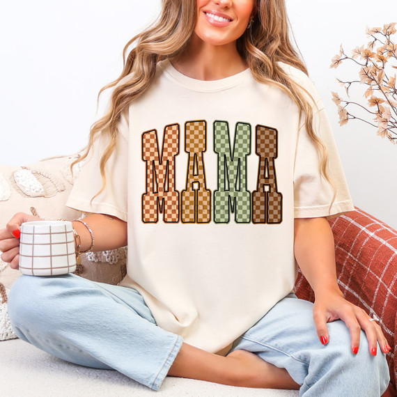 Retro Mama Fall Checker DTF Heat Transfer, colorful checkered design spelling MAMA on a woman's casual t-shirt.