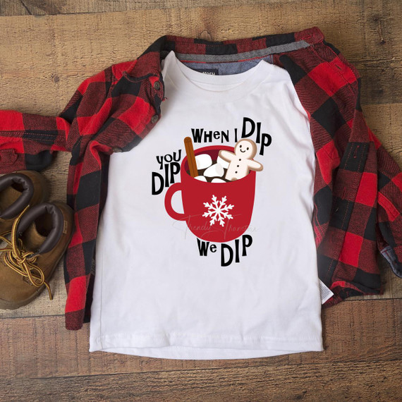 When I Dip You Dip We Dip Cocoa Gingerbread Man Sublimation Transfer, Christmas themed T-shirt design with hot cocoa mug, marshmallows, gingerbread man, and cinnamon stick.