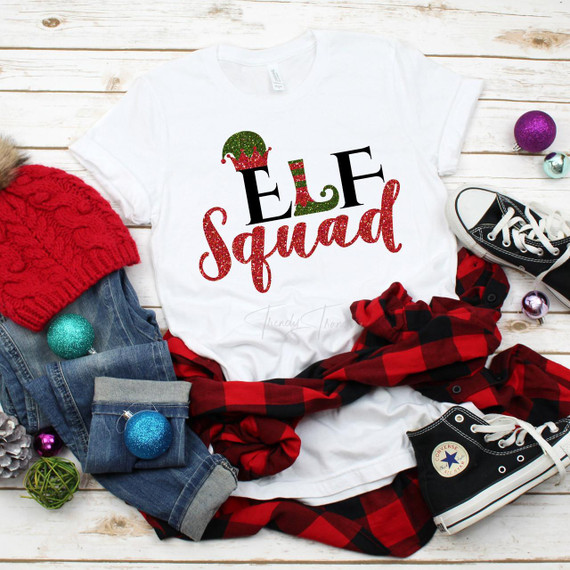 Elf Squad Glitter Effect Christmas Sublimation Transfer, on a white T-shirt with festive holiday design and glitter accents.