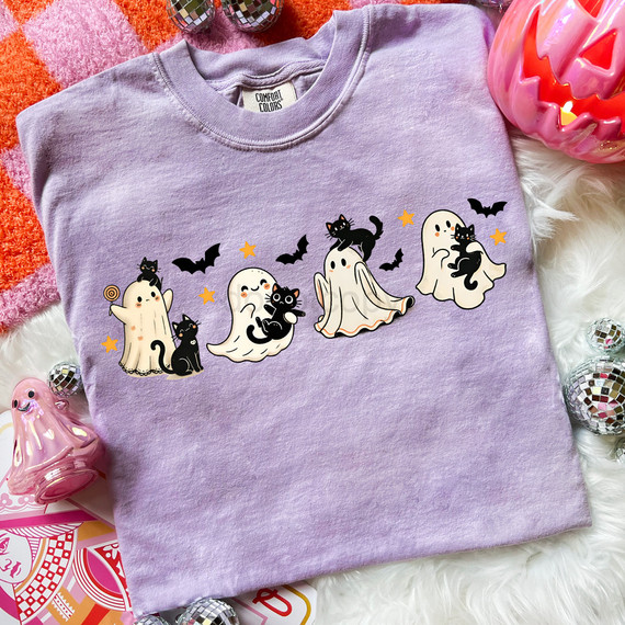 Ghost And Cat Friends DTF Heat Transfer, cute ghost and black cat Halloween-themed design on lavender T-shirt with bats and stars.