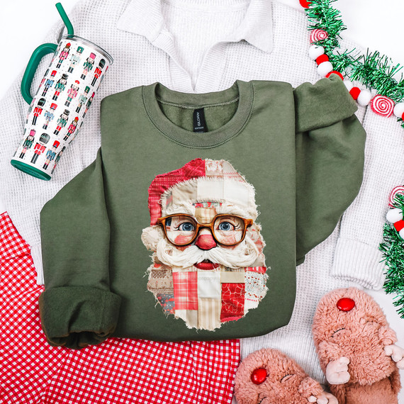 Patchwork Santa DTF Heat Transfer, Christmas-themed shirt with Santa Claus face made of fabric patches.