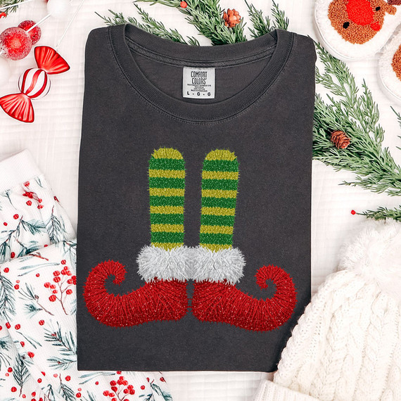 Faux Yarn Elf Shoes DTF Heat Transfer, Christmas-themed t-shirt with elf legs and shoes design.
