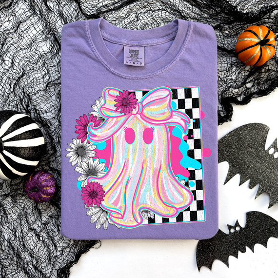 Ghost With Bow DTF Heat Transfer, colorful ghost illustration on purple t-shirt with flowers and checkered background.
