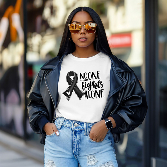 No One Fights Alone Ribbon DTF Heat Transfer, woman wearing a white T-shirt with a black ribbon and text design.