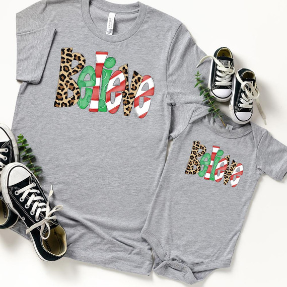 Believe YOUTH Screen Print Heat Transfer, image of a grey T-shirt with a colorful leopard and striped pattern text design, alongside a matching baby onesie and small black sneakers.