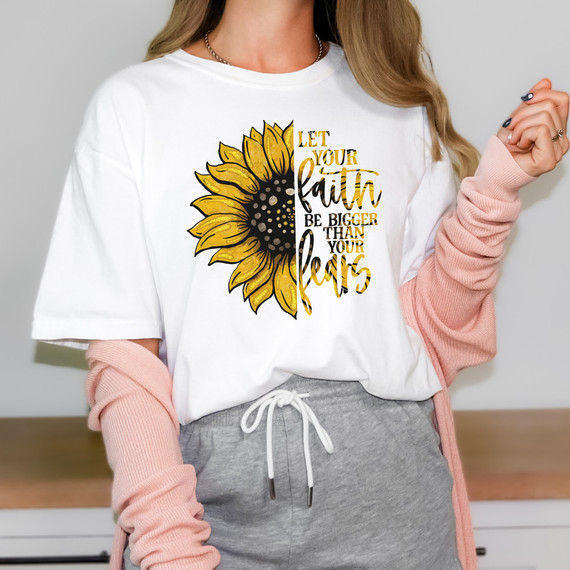 Let Your Faith Sunflower Sublimation Transfer, a white t-shirt featuring a vibrant sunflower graphic and an inspiring motivational quote.
