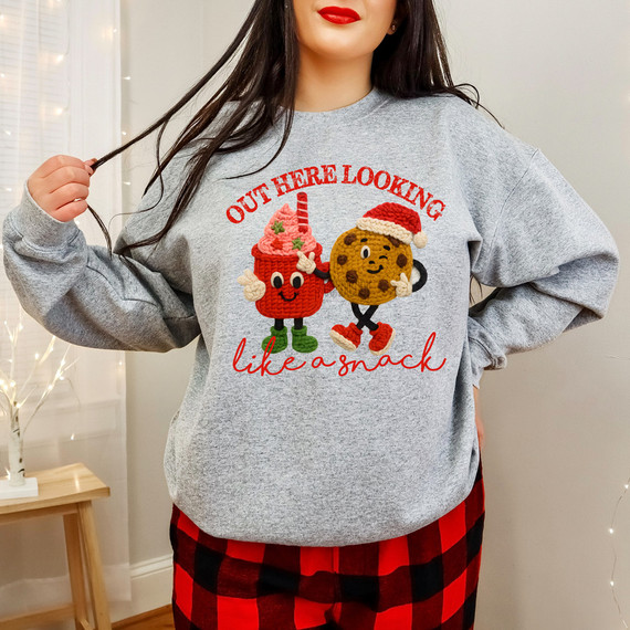 Faux Yarn Out Here Looking Like A Snack DTF Heat Transfer, Christmas-themed yarn basket and cookie characters on a gray sweatshirt.