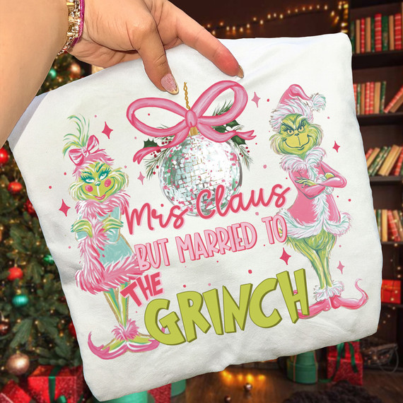 Mrs. Claus But Married To The Grinch DTF Heat Transfer, colorful holiday-themed design featuring Mrs. Claus and the Grinch with festive elements and text.