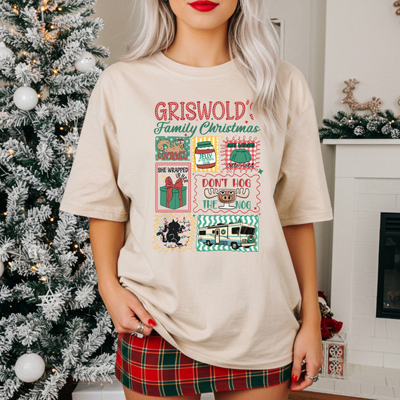 Family Christmas Wagon DTF Heat Transfer, colorful graphic design on a beige t-shirt featuring holiday-themed illustrations and phrases
