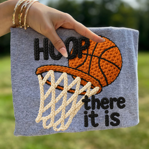Faux Yarn Hoop There It Is DTF Heat Transfer, embroidered basketball hoop and ball with text on gray fabric.