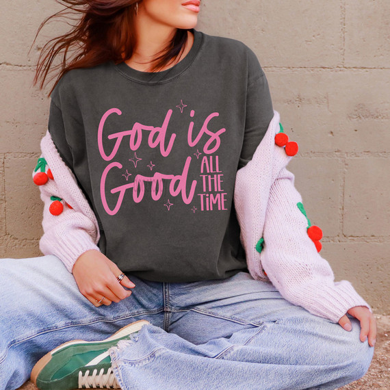God Is Good All The Time PINK DTF Heat Transfer, pink quote design on a dark gray sweatshirt.