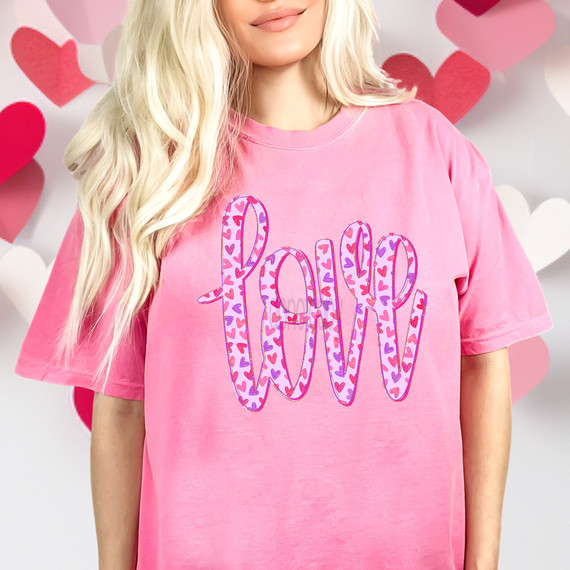 Love Script Heart Pattern DTF Heat Transfer, pink t-shirt with love word design filled with small pink and purple hearts.