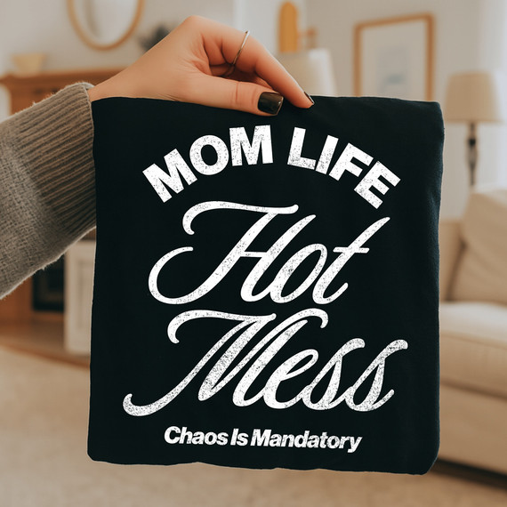 Distressed Mom Life Hot Mess – Chaos Is Mandatory WHITE DTF Heat Transfer, a black fabric with white distressed text design for moms embracing chaos and motherhood.