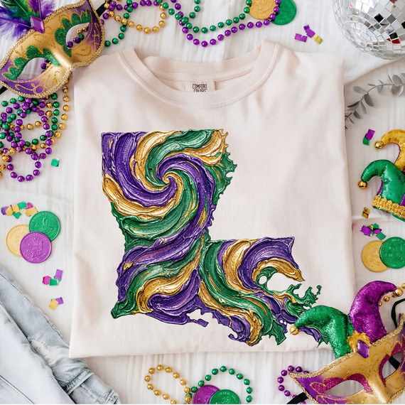 Faux Painted Mardi Gras Louisiana Swirl DTF Heat Transfer, colorful swirl Mardi Gras-themed design on white t-shirt with Mardi Gras accessories around it.