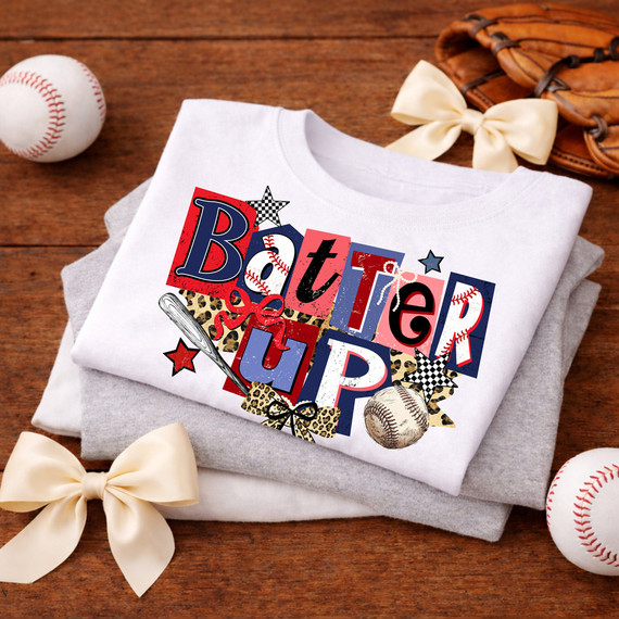 Retro Batter Up DTF Heat Transfer, colorful baseball-themed design on folded T-shirts.