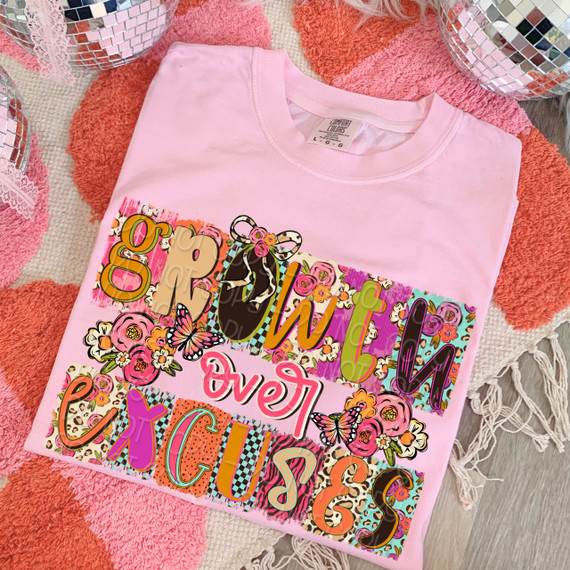 Growth Over Excuses DTF Heat Transfer, colorful and floral graphic design on a pink t-shirt. 