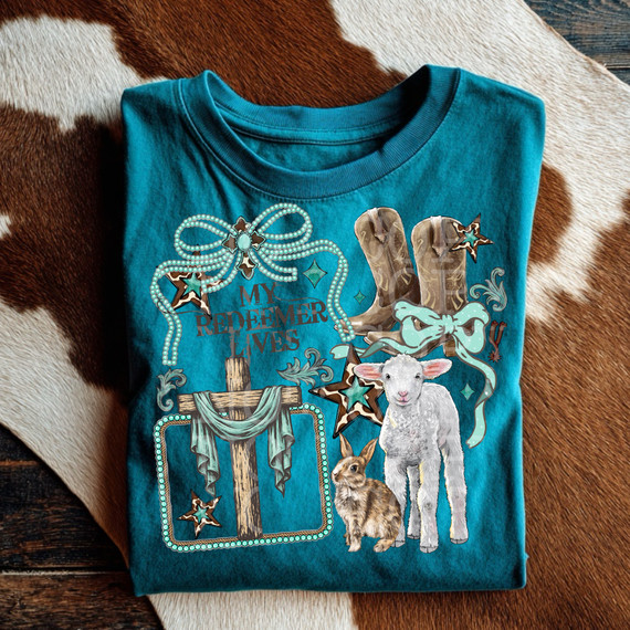 My redeemer lives western Easter DTF heat transfer. Animal elements, large cross and cowgirl boots. Bows, turquoise, and cow print accents.