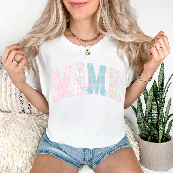 Pastel Patchwork Mama DTF Heat Transfer, image of a woman wearing a white T-shirt with colorful pastel patchwork 'MAMA' design.