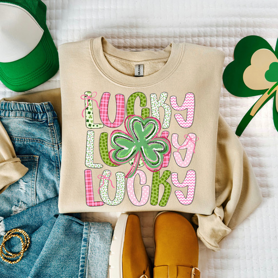 Lucky Lucky Lucky Patterned DTF Heat Transfer, colorful t-shirt with shamrock and playful text design.