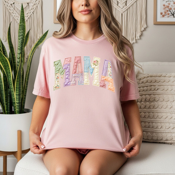 Faux Fabric Patchwork Mama DTF Heat Transfer, a cute pink T-shirt with colorful patchwork letter design.
