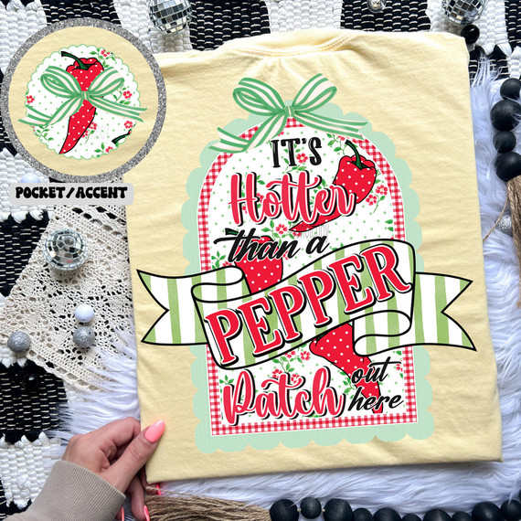 It's Hotter Than A Pepper Patch Out Here SET DTF Heat Transfer, colorful fabric with a design featuring strawberries and a ribbon, suitable for decorating clothing or accessories.