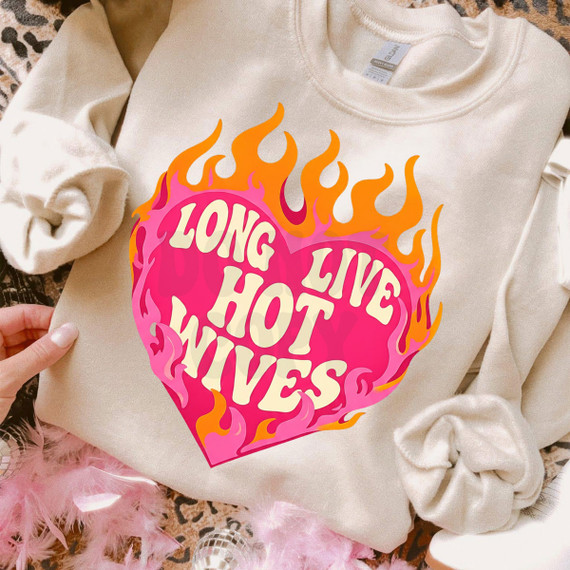 Long live hot wives bubble text inside of a hot pink heart with retro flames surrounding it. 