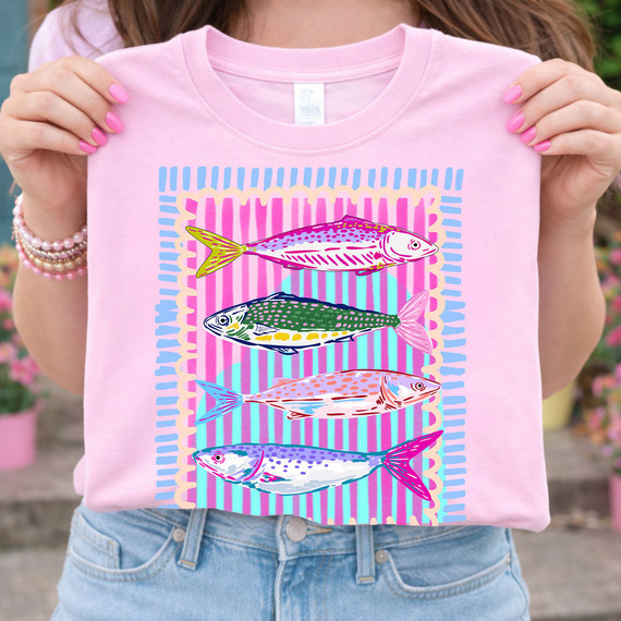 Preppy Fish Stripe DTF Heat Transfer, colorful fish illustration design on pink T-shirt.