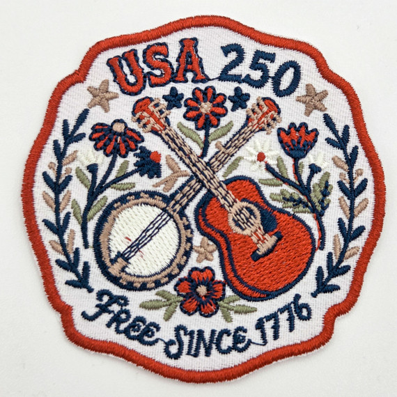 USA 250 Embroidered HAT/POCKET Patch featuring a guitar, flowers, and stars design with embroidery details.