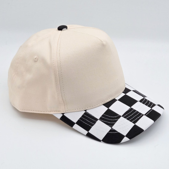 Black & White Cotton Checkered Blank Hats, stylish baseball cap featuring a black and white checkered brim and plain beige crown made of cotton fabric.